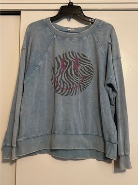 easel Blue Washed Sweatshirt with Black Zebra Smiley and Pink Accents